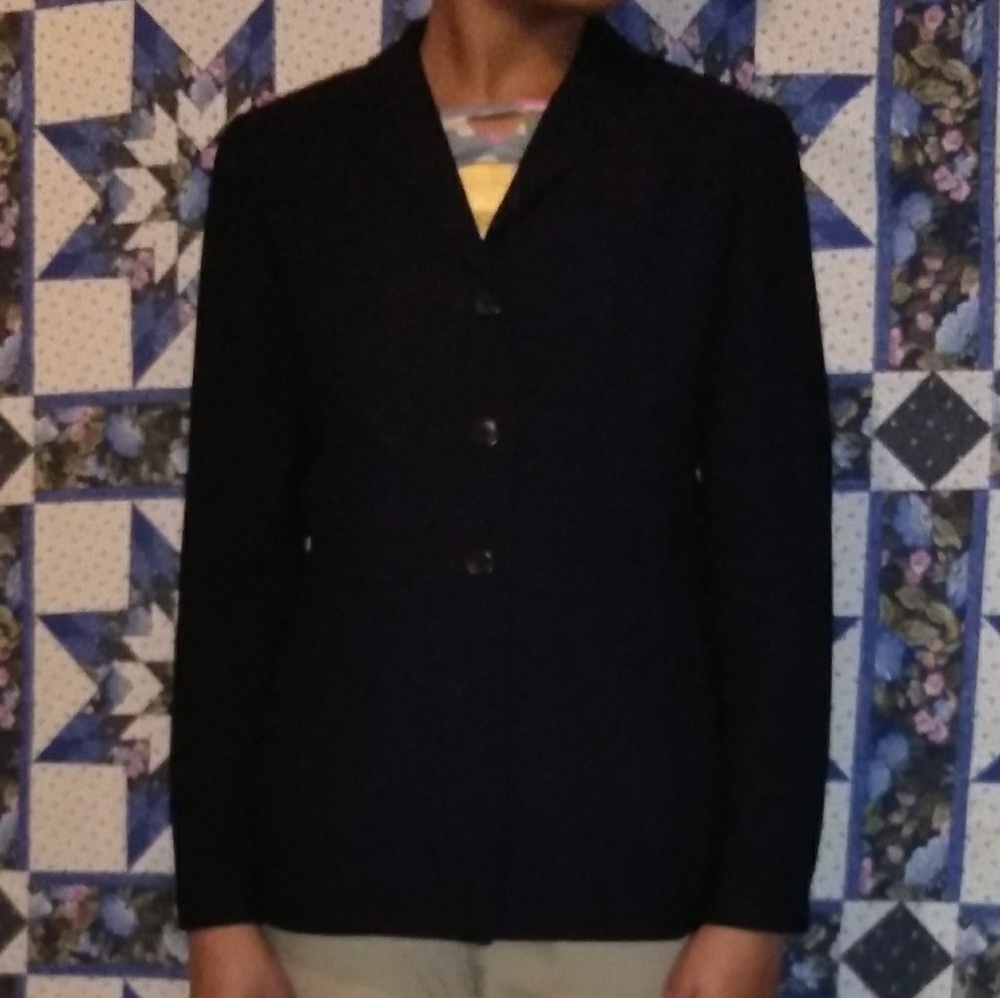 Black button down suit jacket by Georgina …